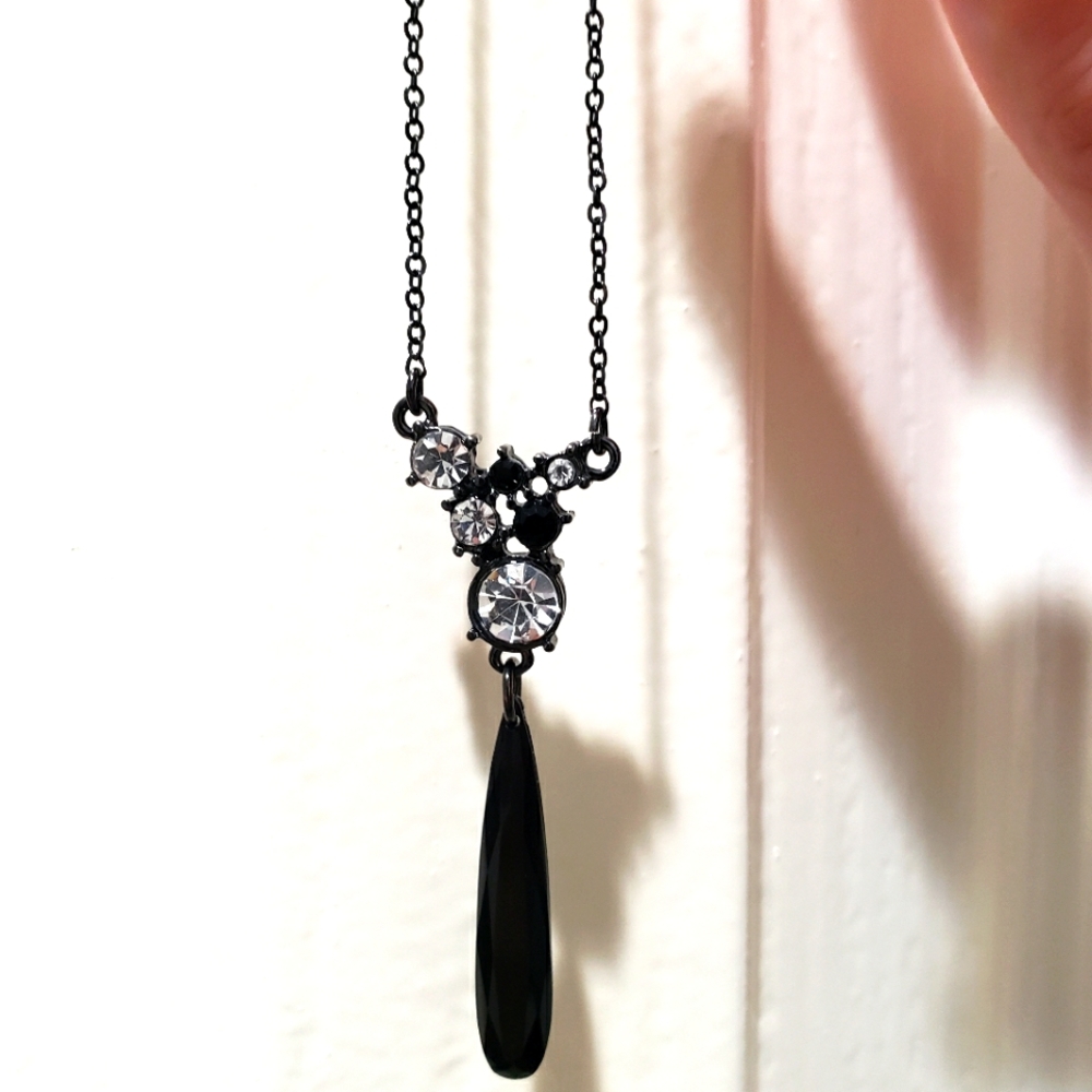 Beautiful black stone and white crystal statement necklace.